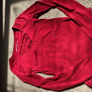 Long sleeved red women’s top